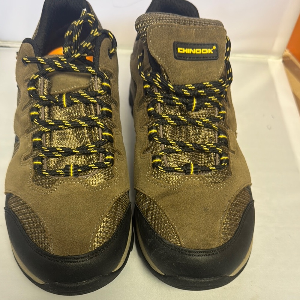 Brown and Black Athletic Shoes with Durable Sole and Protective Toe Cap